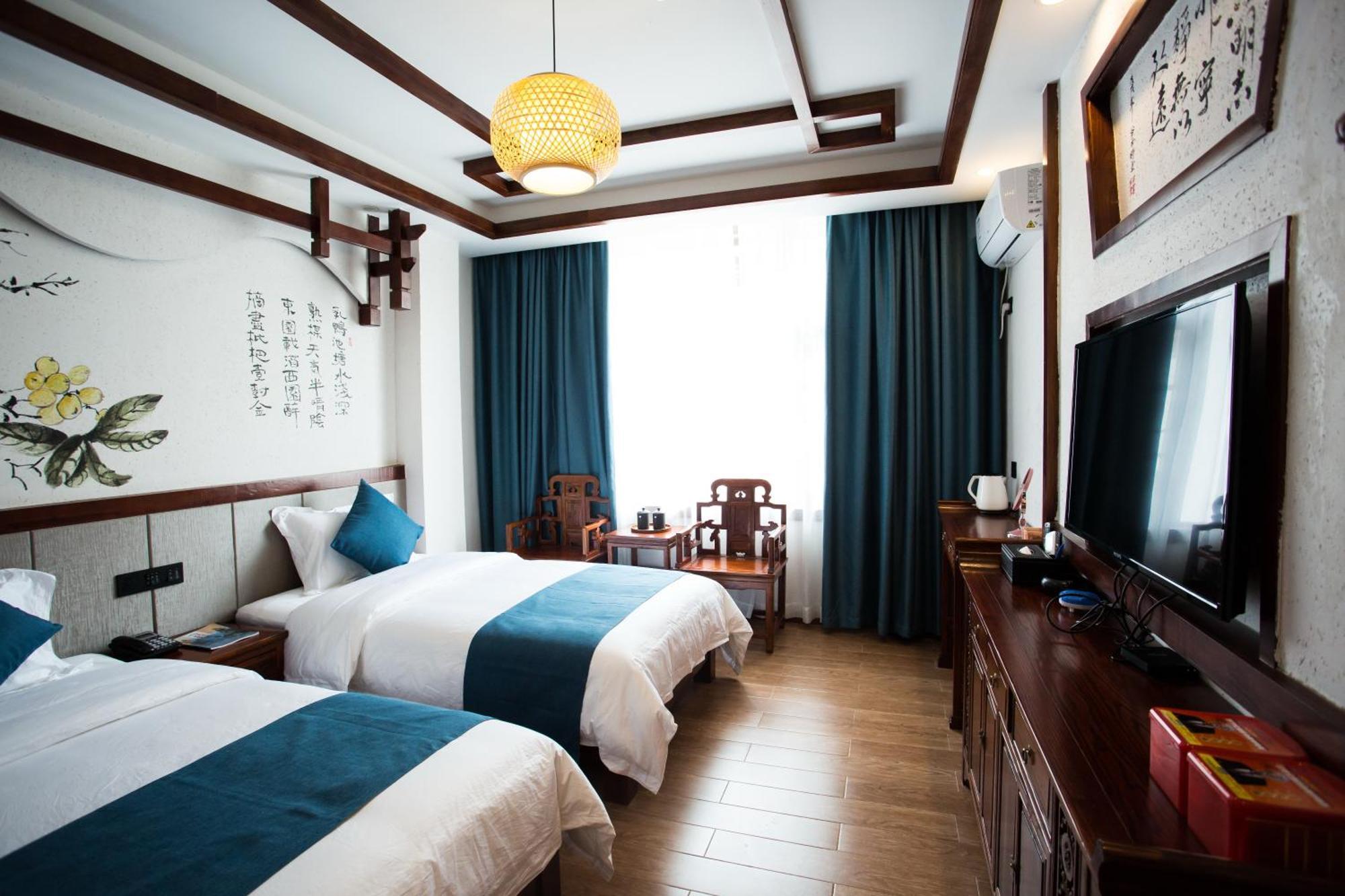 一树一花客栈眷恋店 Apartment Wulingyuan Luaran gambar